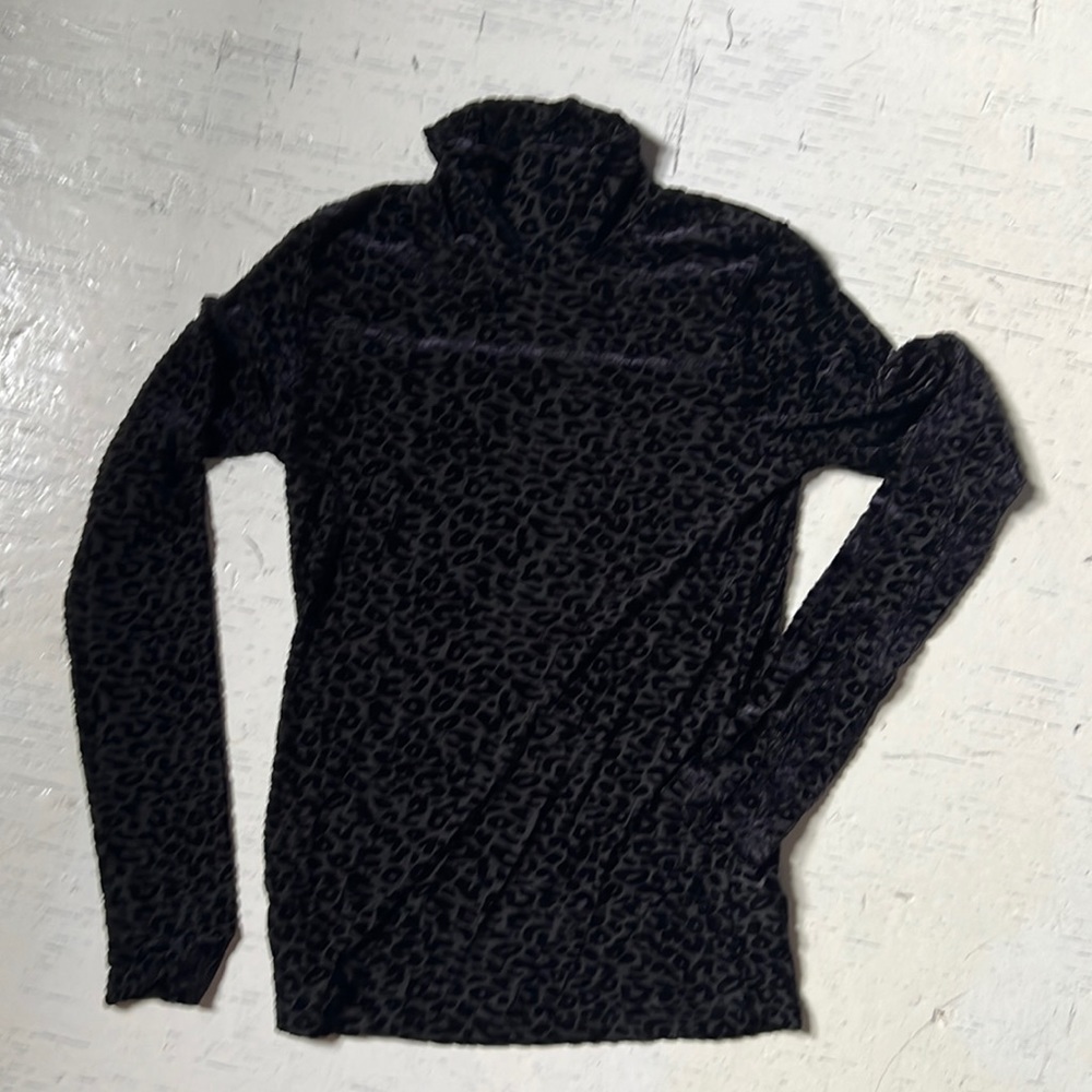 Semi-sheer black velvet leopard turtleneck